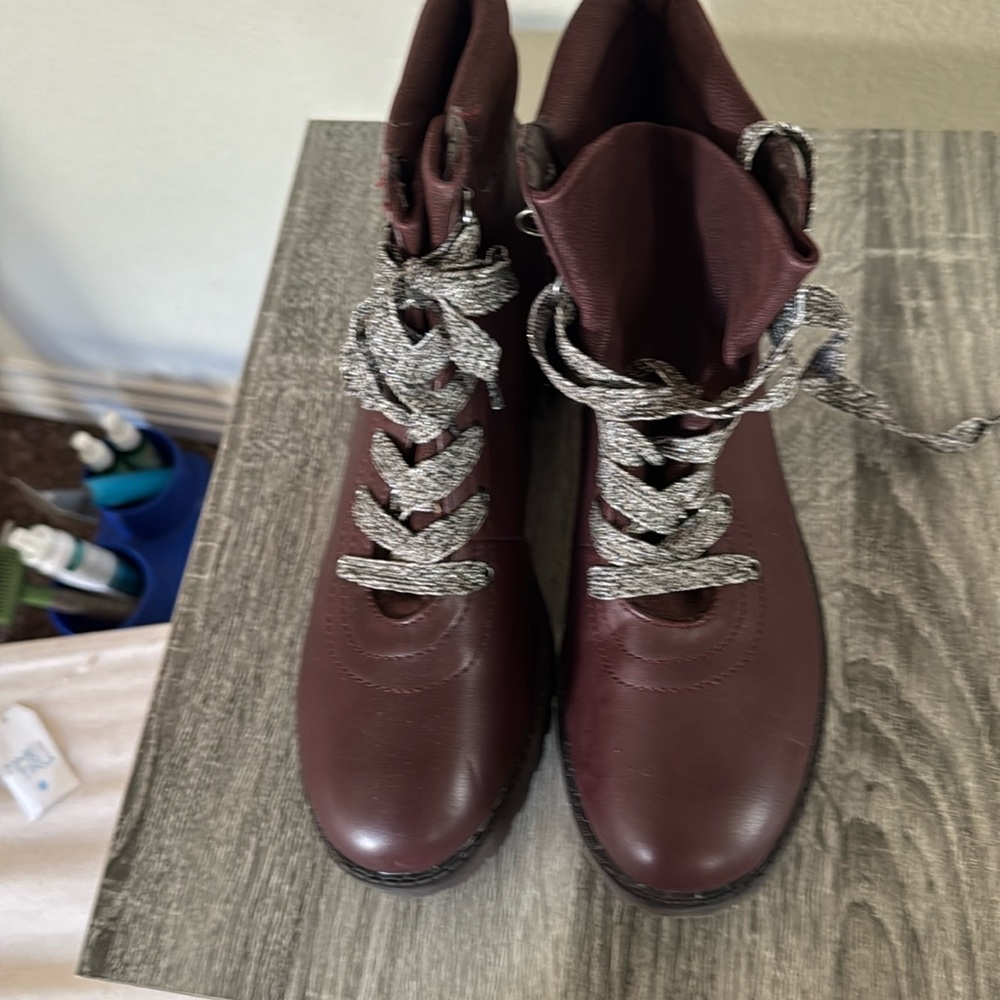 Brand new women’s size 9 1/2 Maurice burgundy boots in time for Christmas